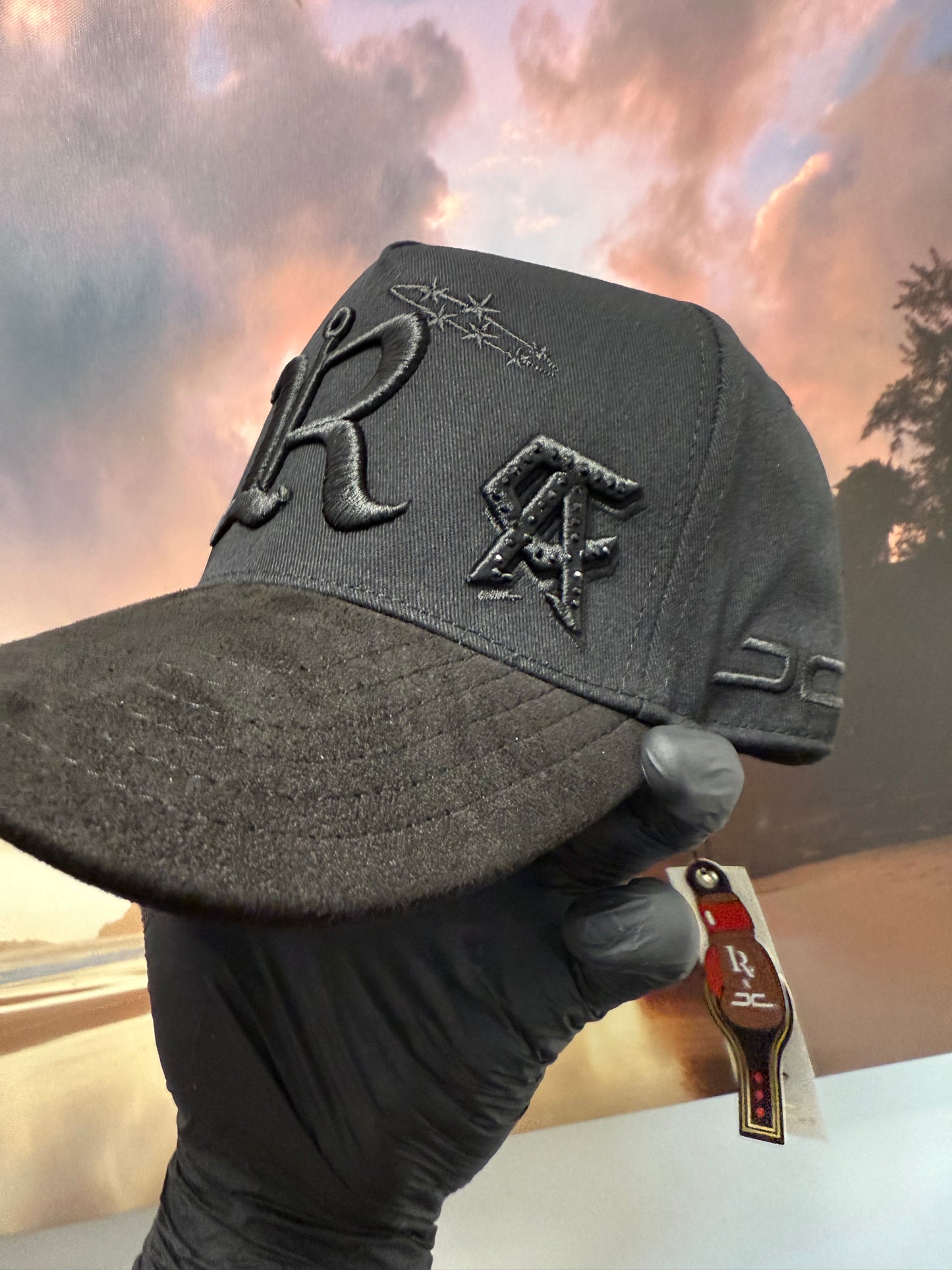 JC hats Luis R Canelo
