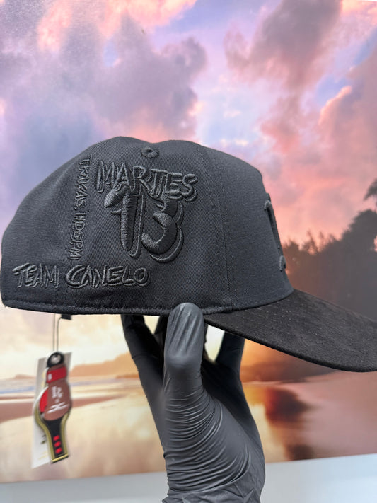 JC hats Luis R Canelo