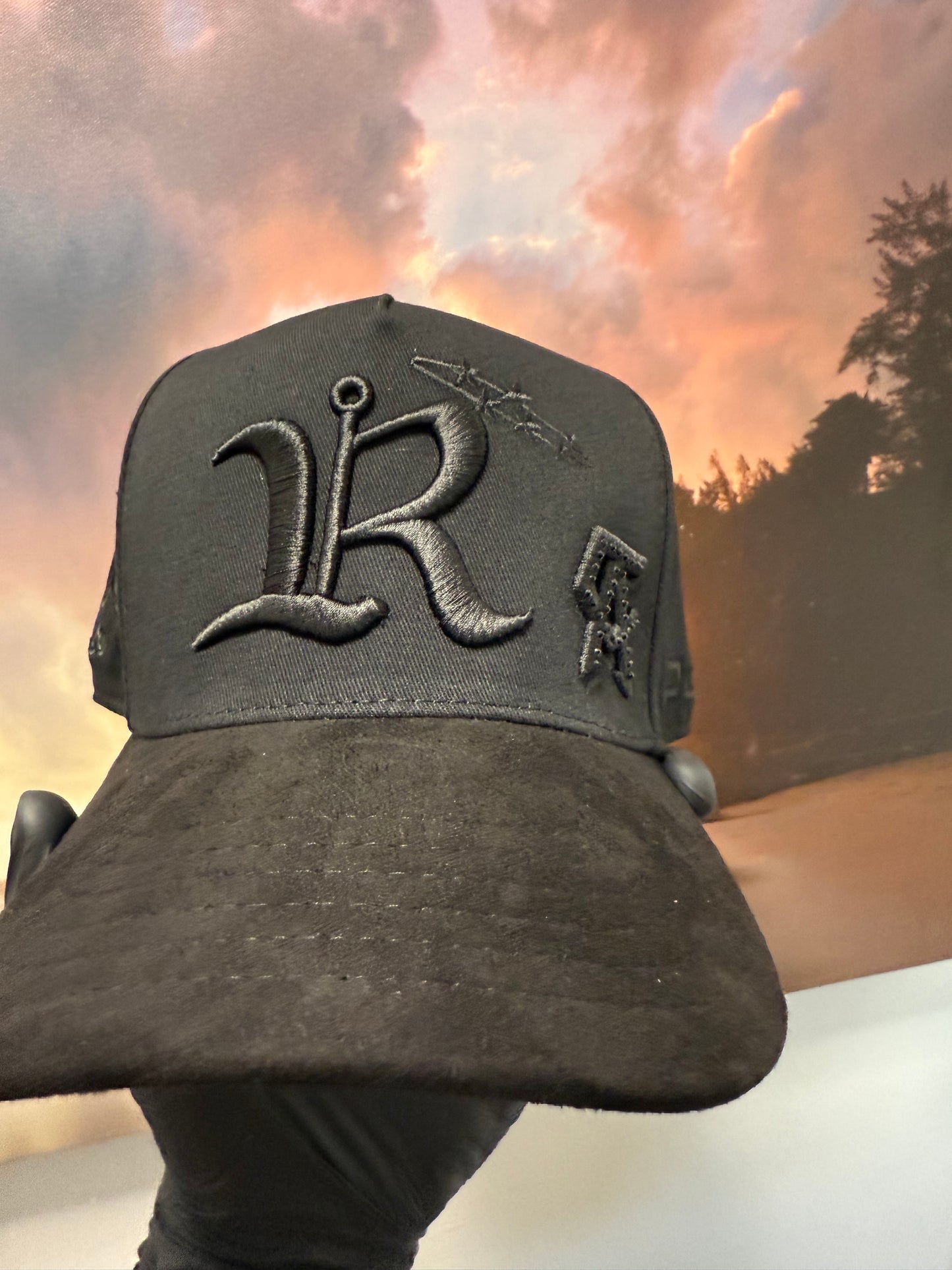 JC hats Luis R Canelo